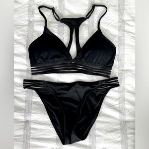 La Vie en Rose swim edition black bikini with strip mesh details.